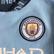Manchester City FC Baby Kit Home Sleepsuit | 2024/25
