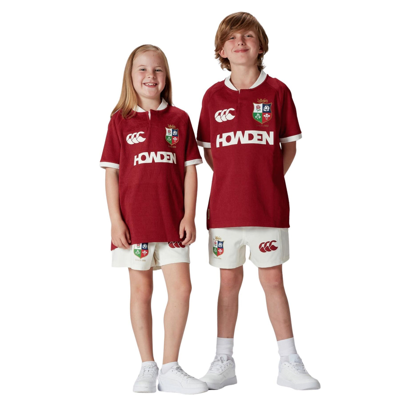 A photo showing two children wearing the new official British & Irish Lions jersey shirt
