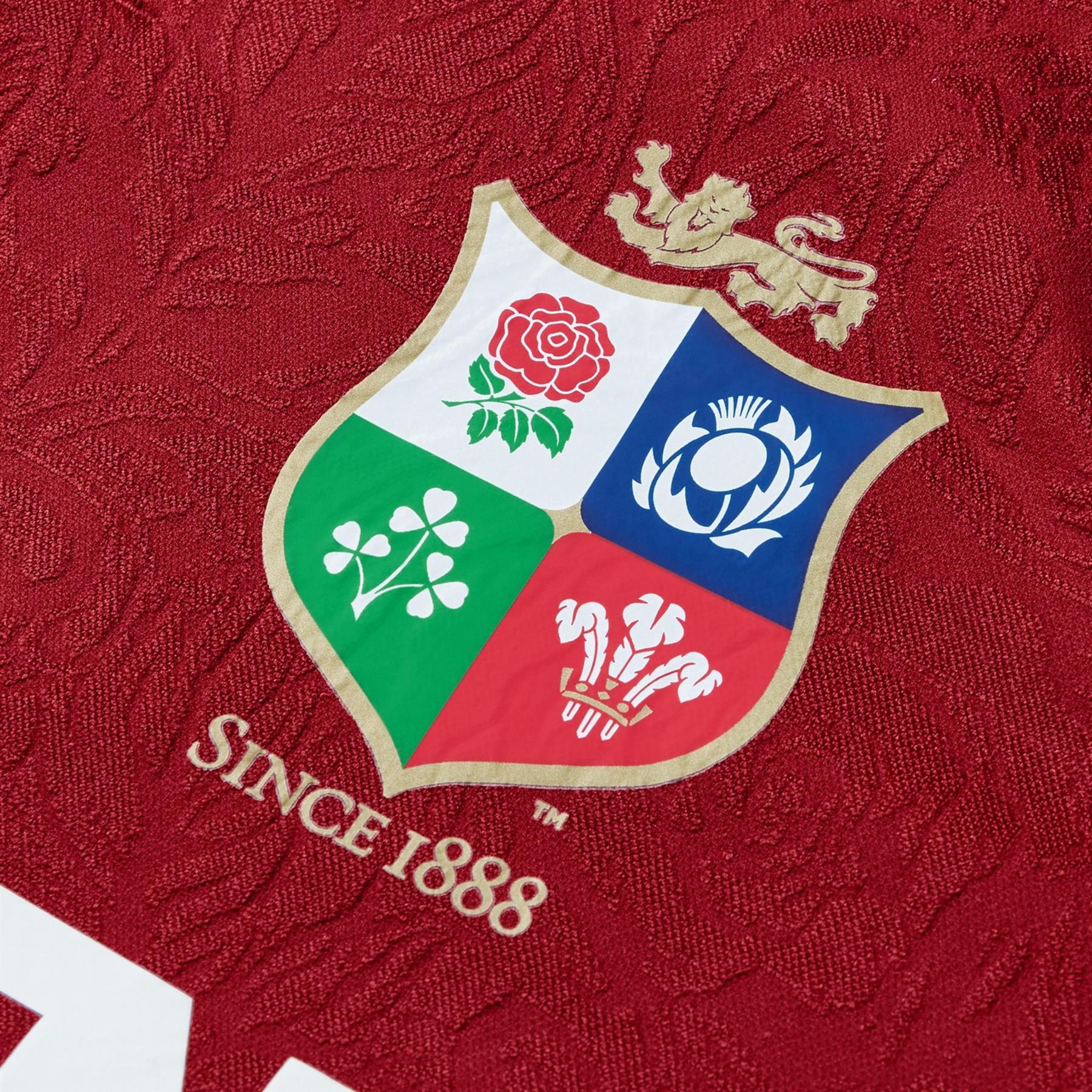 A photo showing the printed Lions logo on the front of the new official British & Irish Lions jersey shirt. Junior sized